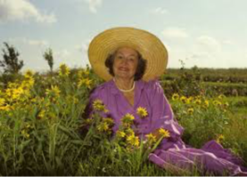Lady Bird Johnson among sunflowers